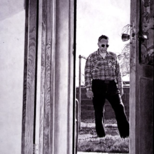 Man in Doorway. Charcoal drawing.